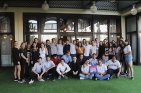 Group of people celebrating on stage