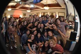 Group of people celebrating on stage