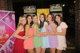 Group of people celebrating on stage