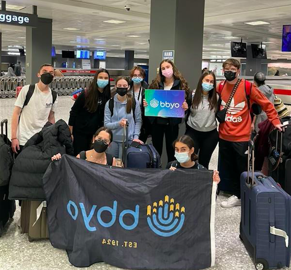 Group of people celebrating on stage