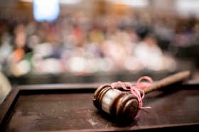 Group of people celebrating on stage