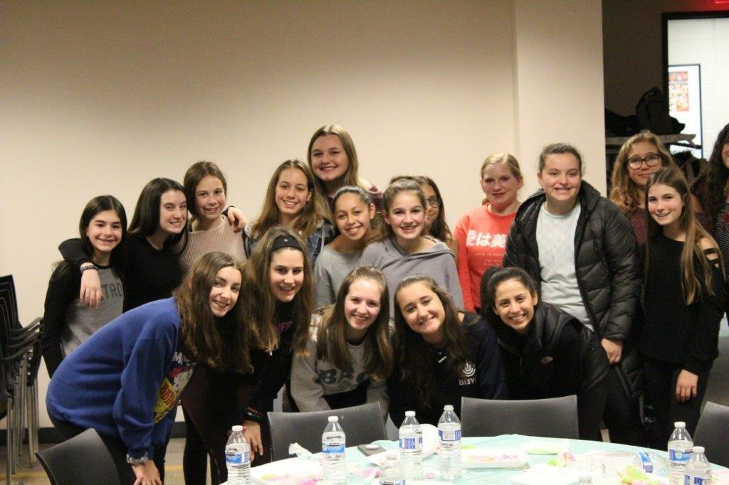 Group of people celebrating on stage