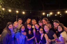 Group of people celebrating on stage