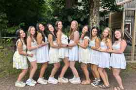 Group of people celebrating on stage