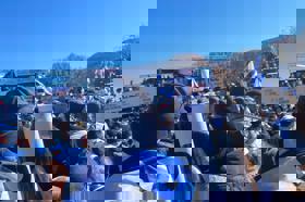 Group of people celebrating on stage